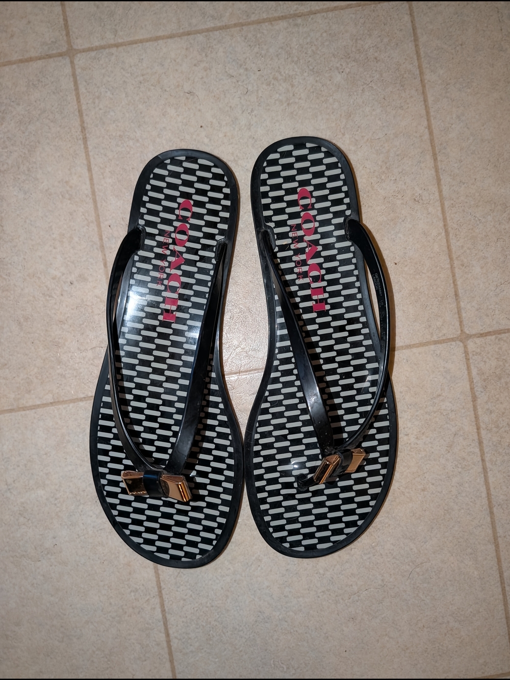 Coach Black Patterned Jelly Flip Flops with Pink Logo and Gold Accents
